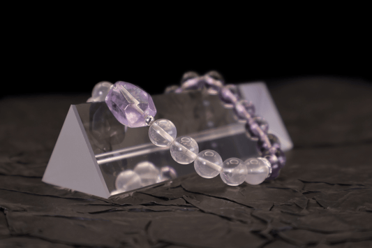 Amethyst & Pink Quartz Bracelet I on a black background