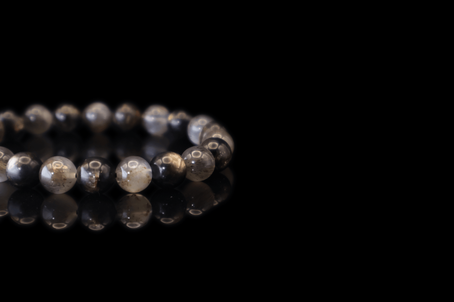 Black Golden Lepidolite & Black Backbone Bracelet I on black background