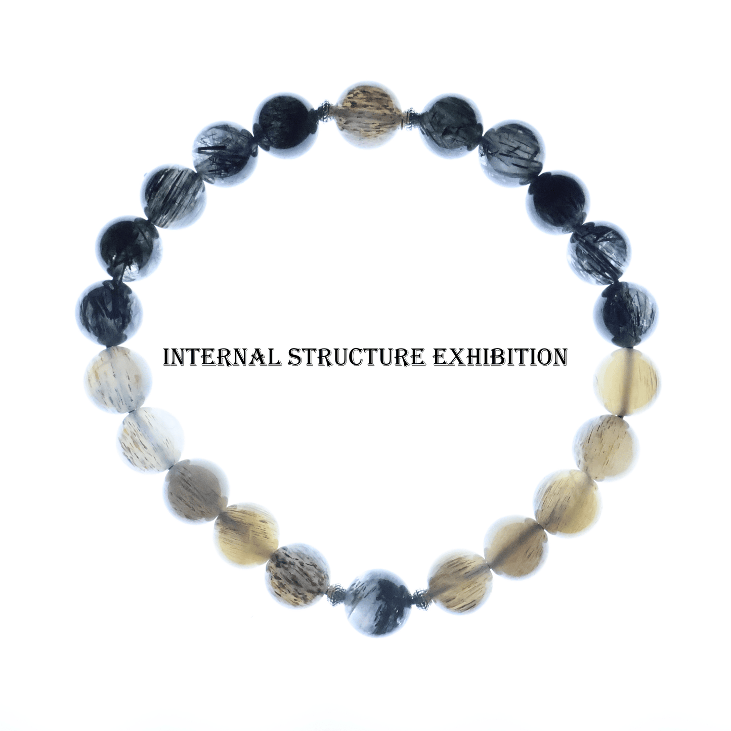Black Rutile & Backbone Bracelet I on white background, which shows internal structure