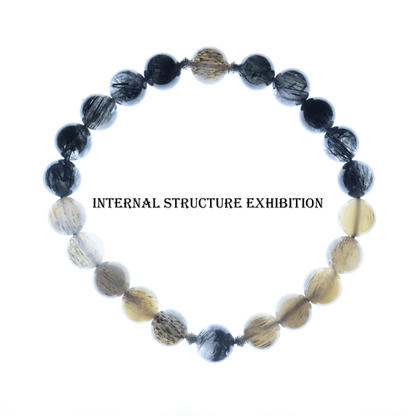 Black Rutile & Backbone Bracelet I on white background, which shows internal structure