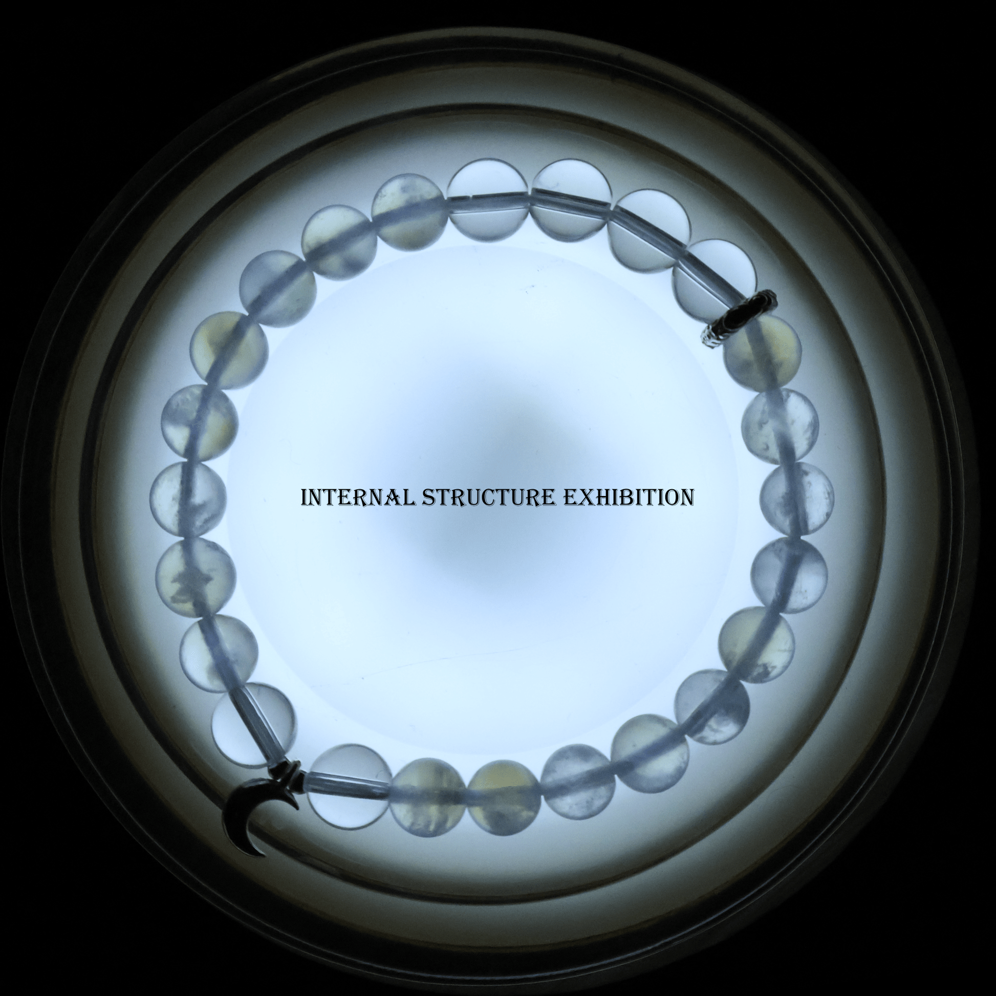 Blue Moonstone & Clear Quartz Bracelet I on white background, which showing its internal structure