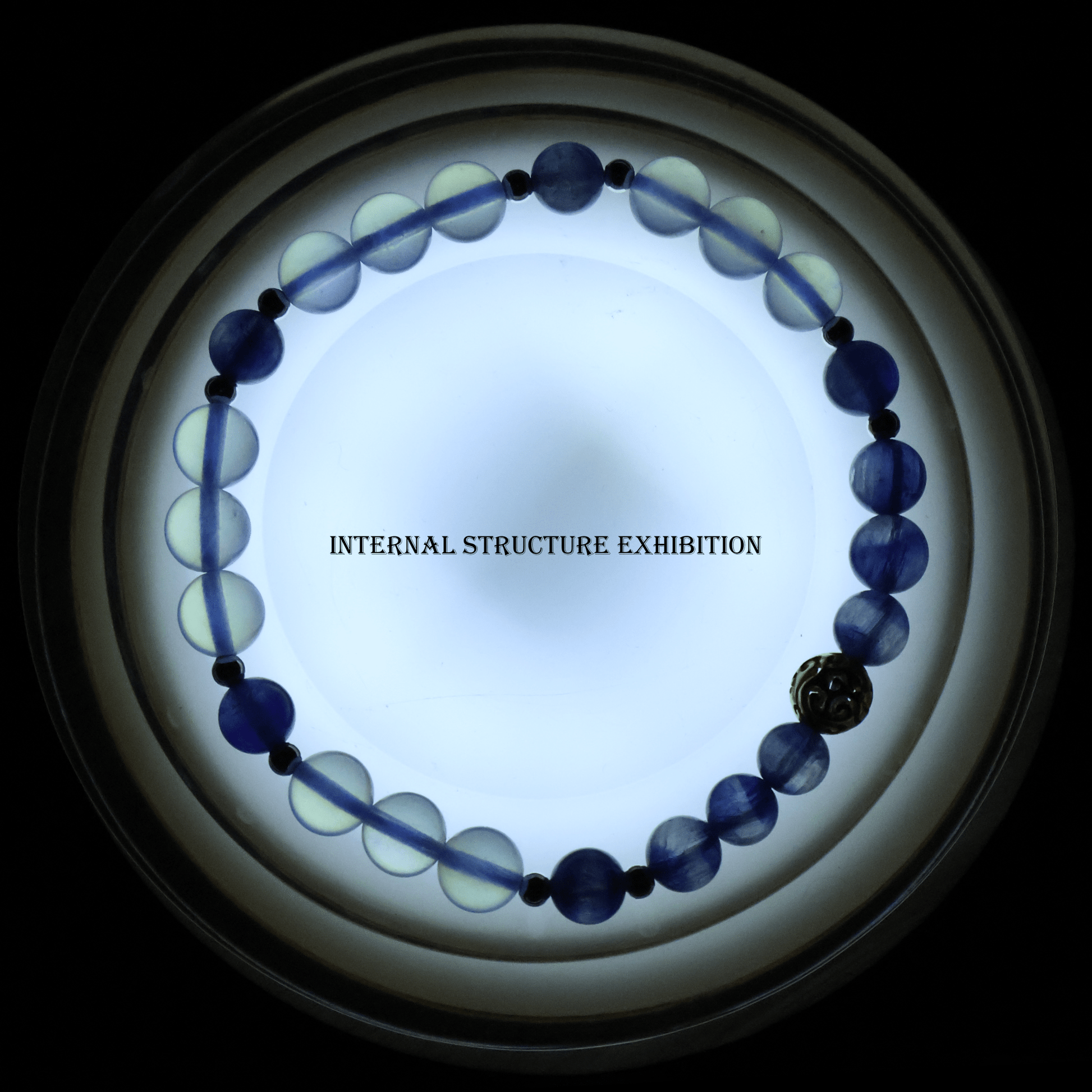 Kyanite & Aquamarine Bracelet I on white background, which shows its internal structure