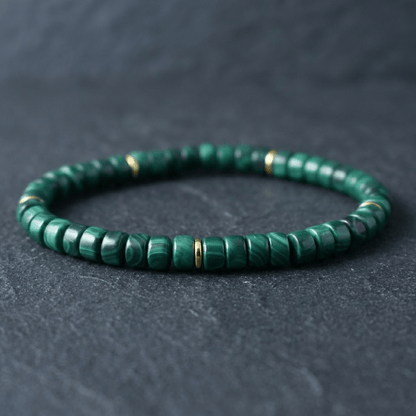 Malachite Bracelet I (straight-cut) on gray stone slabs